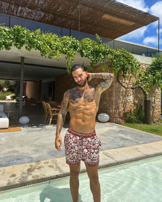 Maluma red shorts from Instagram IG post Agua Bendita from Saks Fifth Avenue terracota Verano Road Cassius Swim Shorts Gent's Post