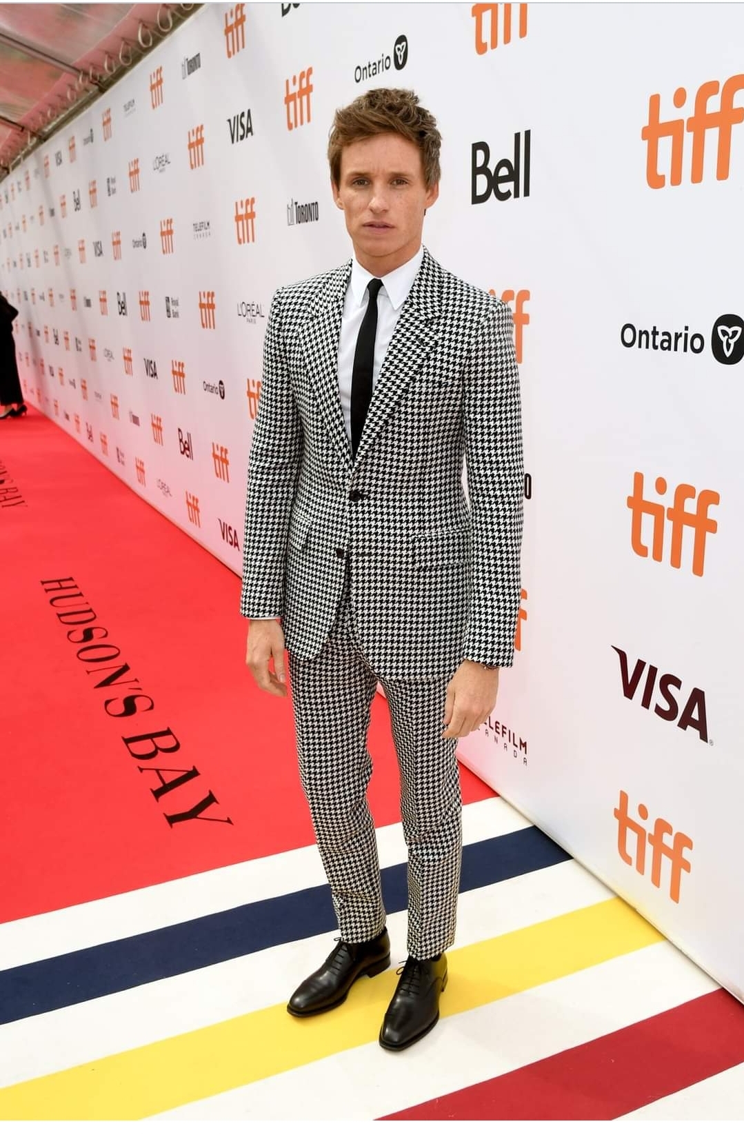 Eddie Redmayne at a TIFF red carpet. (Photo: Kevin Winter)