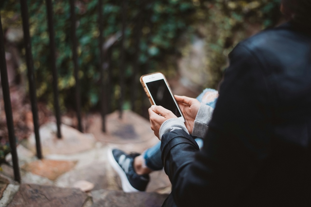 guy using his cell phone