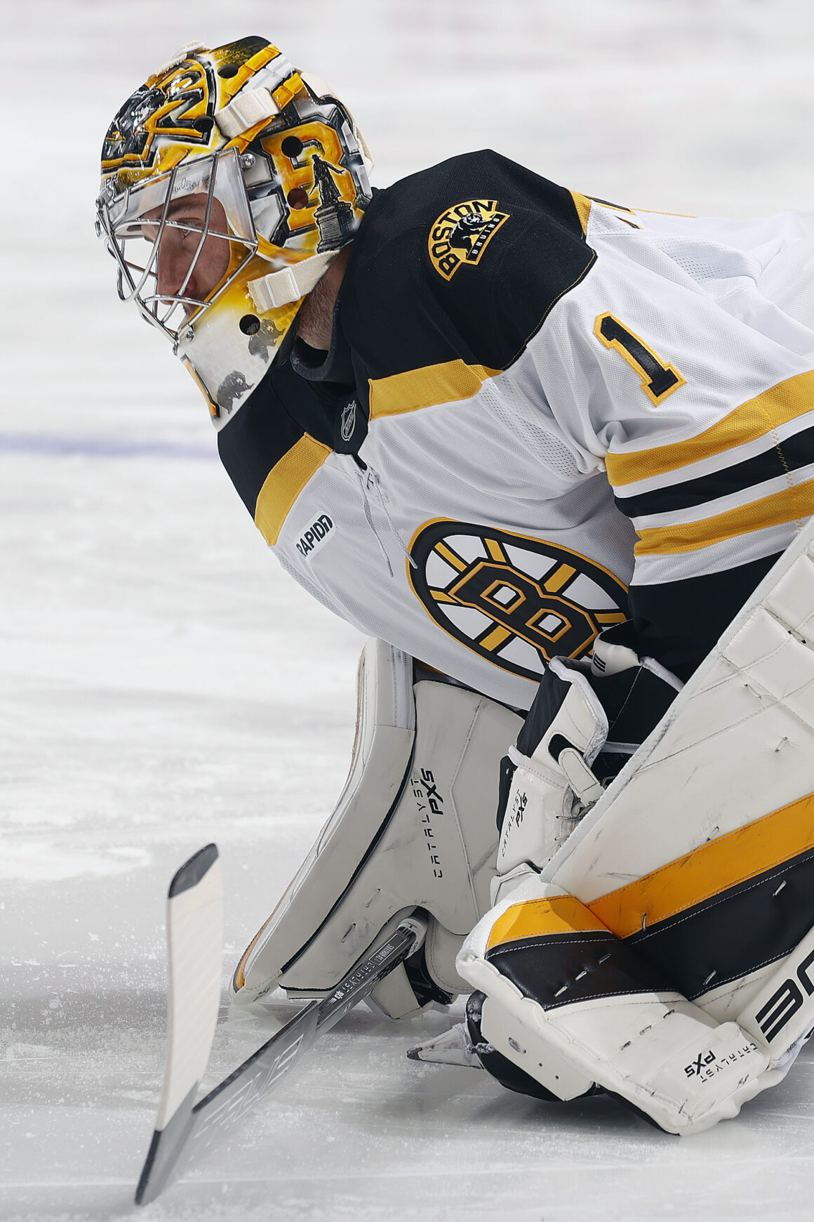 SUNRISE, FLORIDA - OCTOBER 8: Goaltender Jeremy Swayman #1 of the Boston Bruins stretches on the ice prior to their game against the Florida Panthers at the Amerant Bank Arena on October 8, 2024 in Sunrise, Florida. (Photo by Eliot J. Schechter/NHLI via Getty Images) apple made on ipad campaign