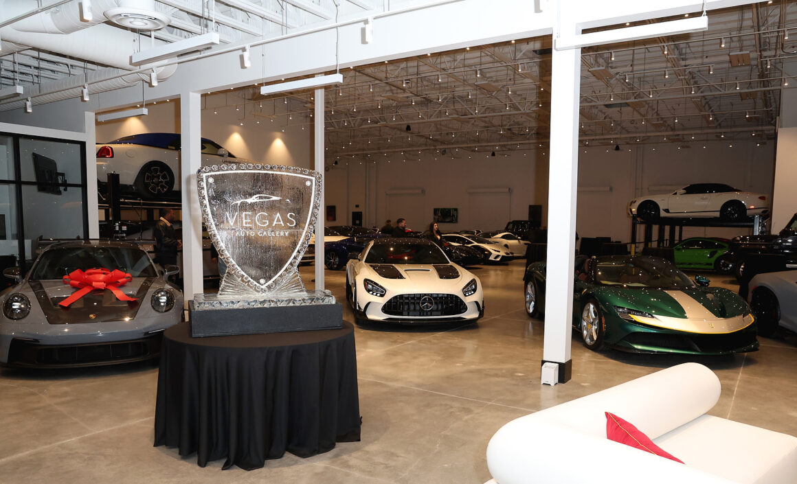 LAS VEGAS, NEVADA - DECEMBER 07: An ice sculpture and vehicles are displayed during the grand opening of Vegas Auto Gallery on December 07, 2024 in Las Vegas, Nevada. (Photo by Gabe Ginsberg/Getty Images for Vegas Auto Gallery)