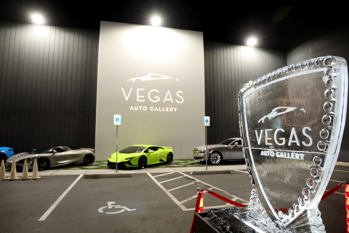 LAS VEGAS, NEVADA - DECEMBER 07: An ice sculpture and vehicles are displayed outside during the grand opening of Vegas Auto Gallery on December 07, 2024 in Las Vegas, Nevada. (Photo by Gabe Ginsberg/Getty Images for Vegas Auto Gallery)