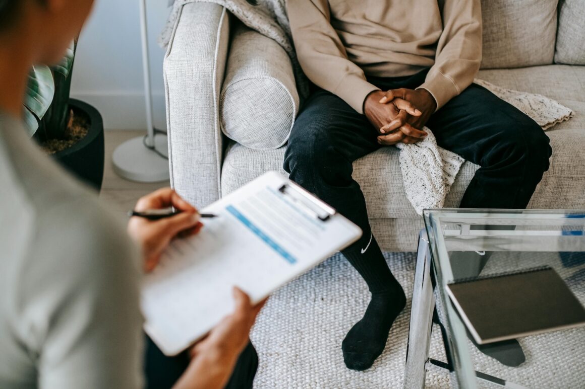 Doctors office men discussing incontinence its more common than people think one in three men over 40 likely already experience it.