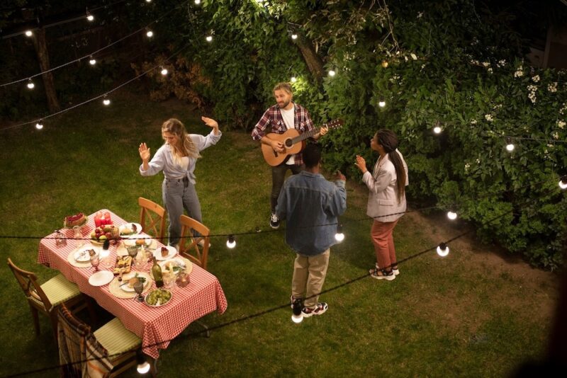 People having a party in the backyard