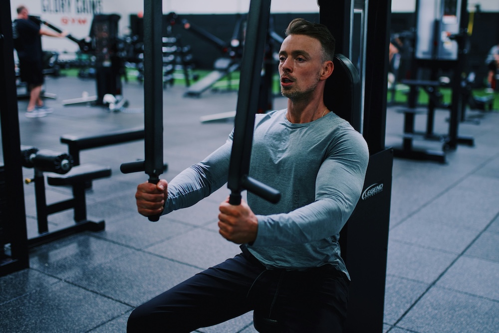 Guy working out at a gym.
