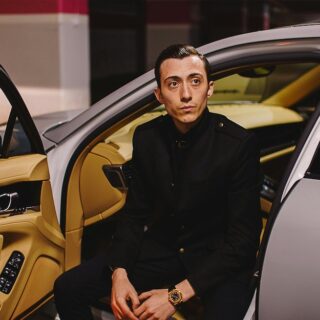 Guy with watch inside car
