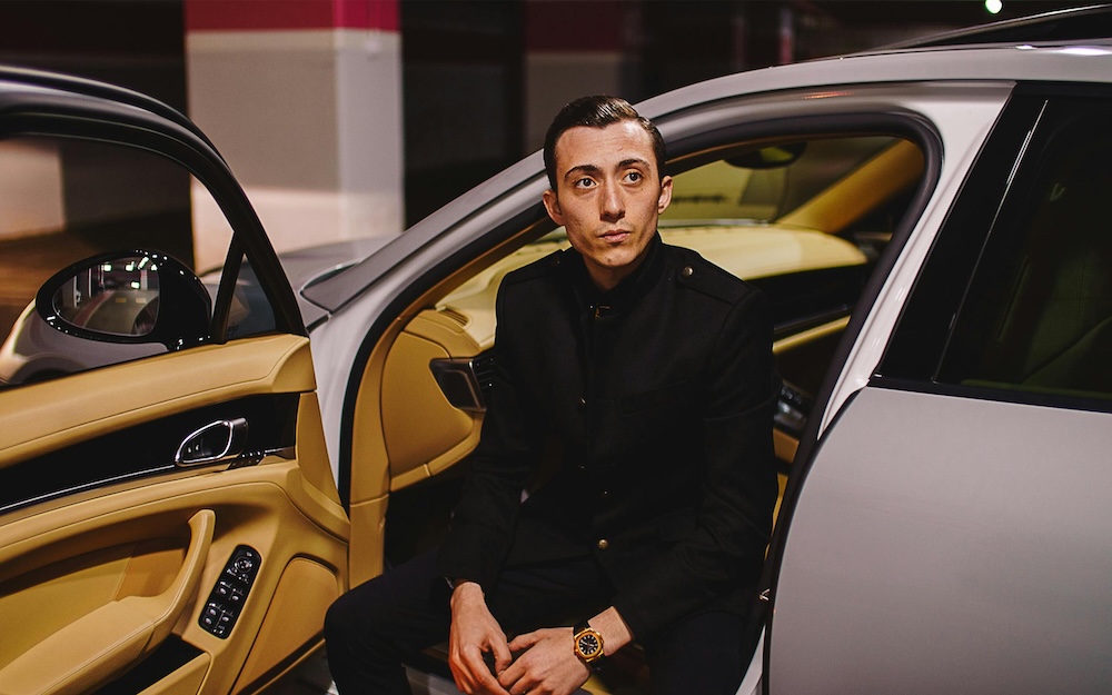 Guy with watch inside car