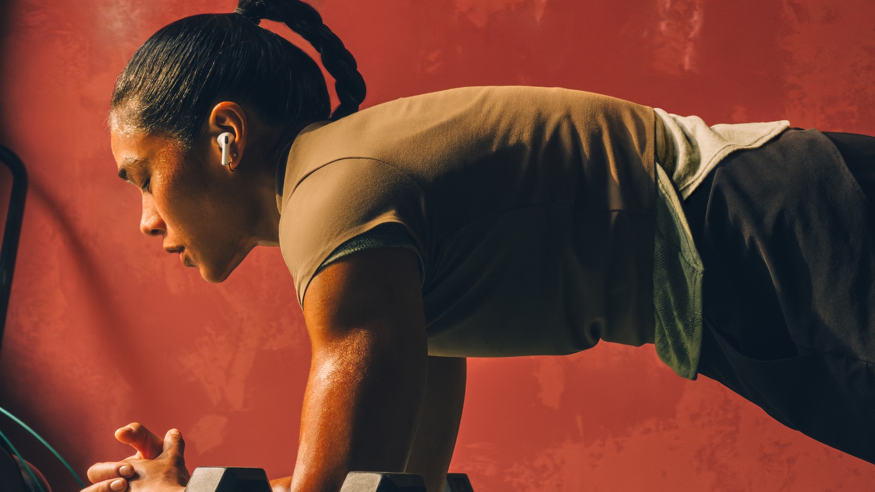 Apple AirPods Pro 3 used for fitness with in-ear heart rate monitor sensors and workout buddy in your ear. 