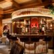 Four Seasons Resort & Residences Whistler Canada's Number 1 resort named by Travel & Leisure magazine CN Traveller new bar The Library by The Macallan Bar in the lobby ultimate must visit apres ski in Whistler top place near you to visit
