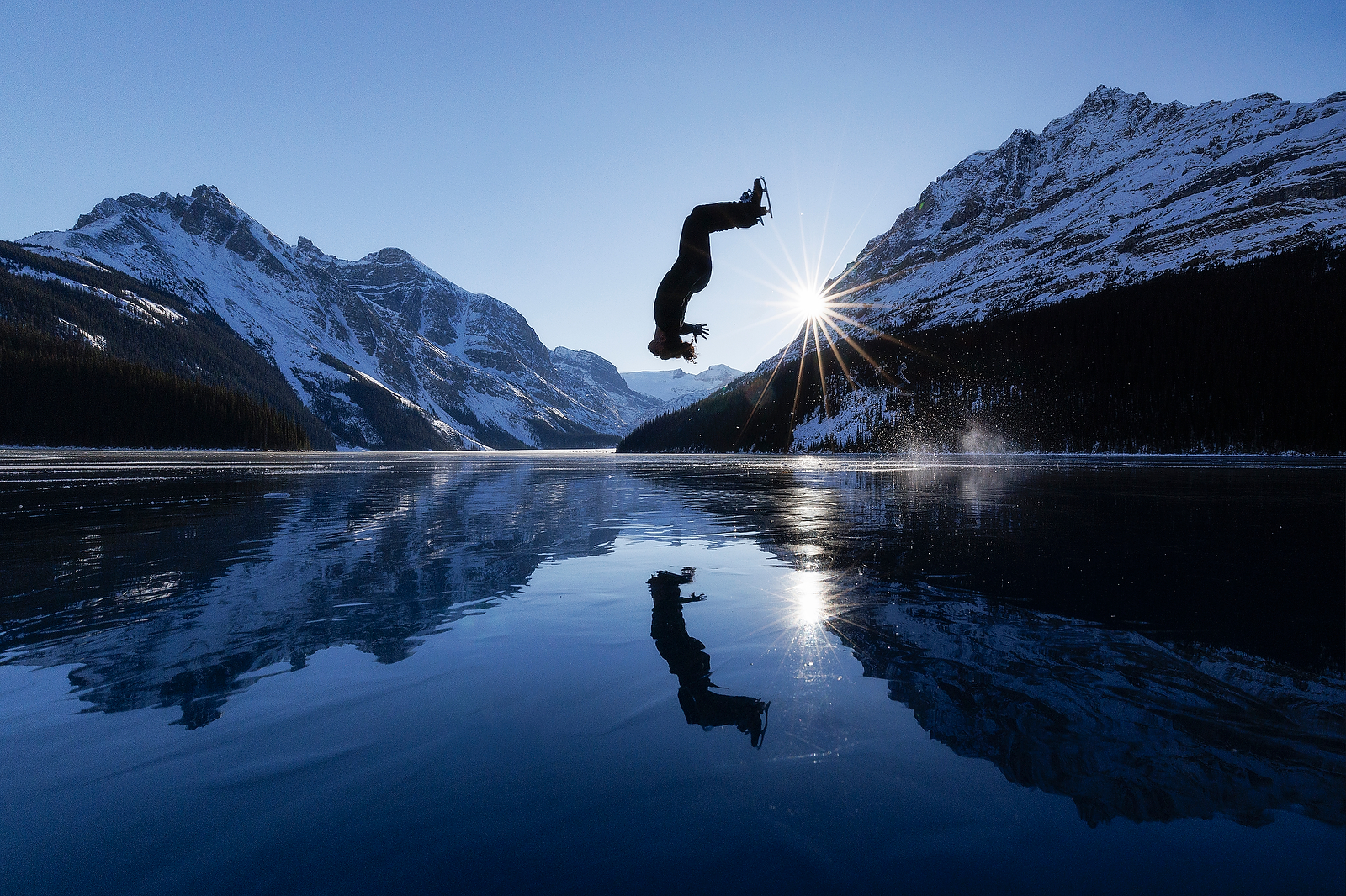 Elladj Balde on wild ice with pro mountaineer Paul Zizka