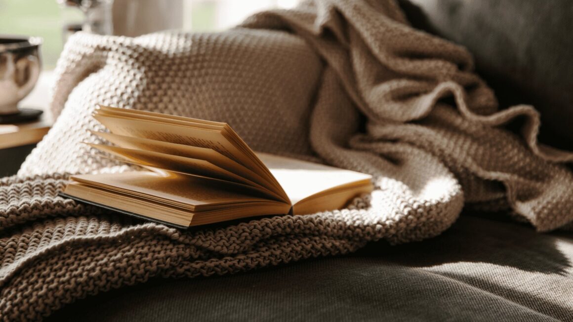 Cozy book with a blanket. Cozy is the new luxury. 