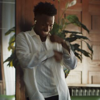 Vini Jr. of the Brazilian national soccer team in Apple's latest AirPods Pro 3 campaign dancing to a mystery song now released