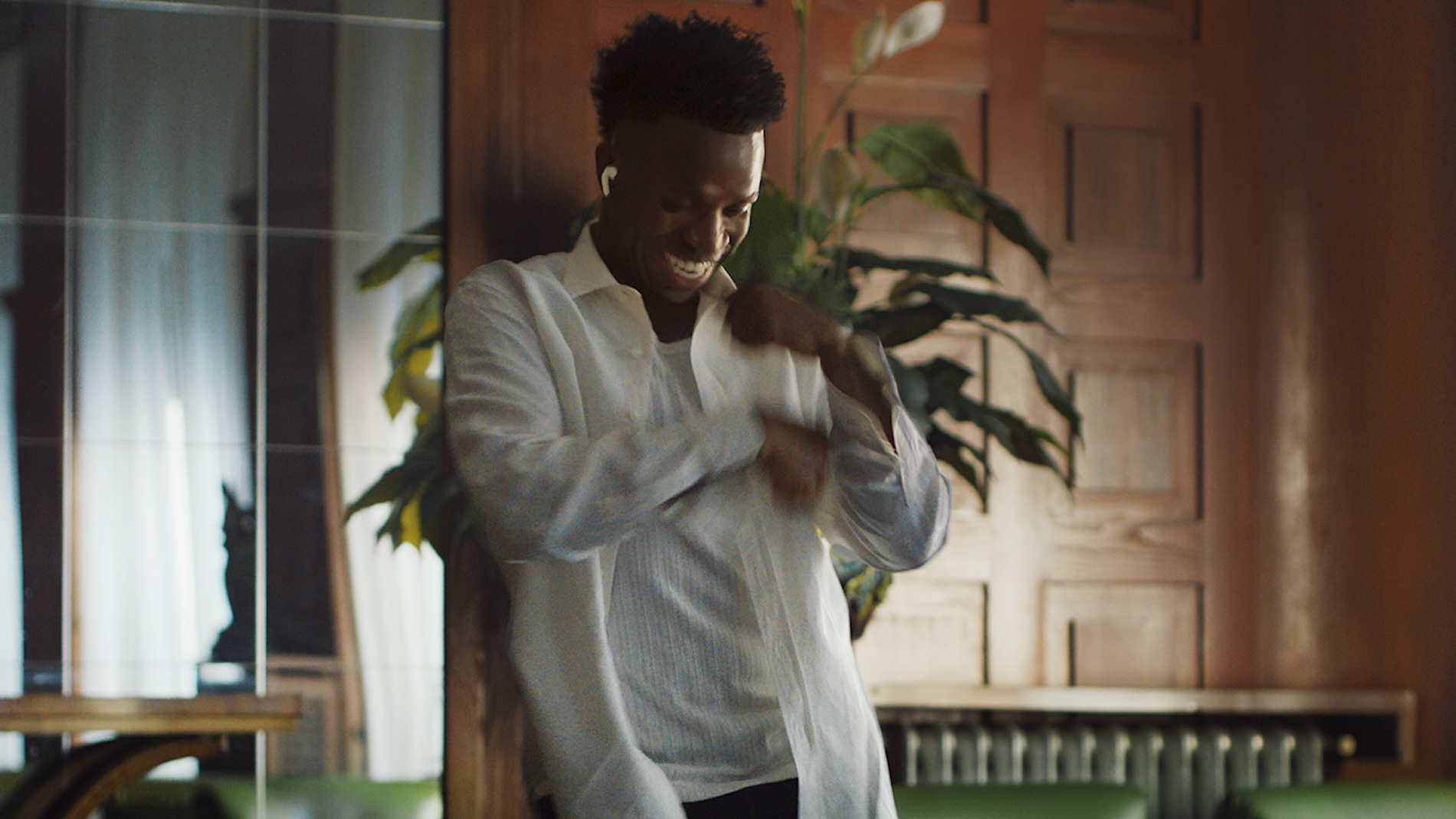 Vini Jr. of the Brazilian national soccer team in Apple's latest AirPods Pro 3 campaign dancing to a mystery song now released