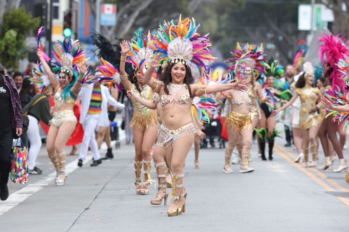 Traditional samba dancers take to the streets. (photo: Pexels)